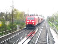 7-Aprilwetter 185 041 DB Cargo bei Bamberg mit leeren Erzzug Linz-Rotterdam 01.04.2024